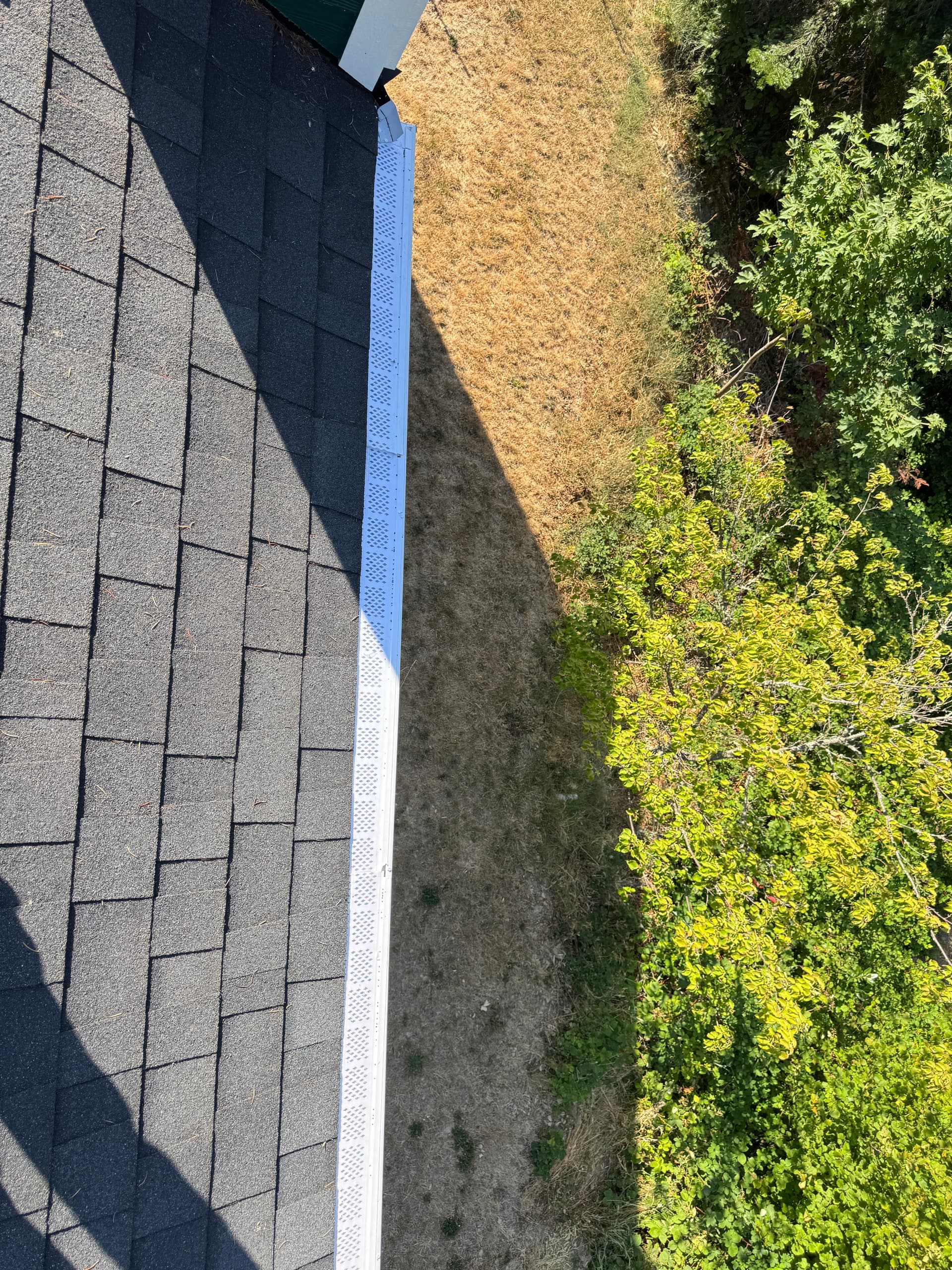 Gallery photos for Gutter Cleaning and Screen Install on a Two-Story Home: Image #2